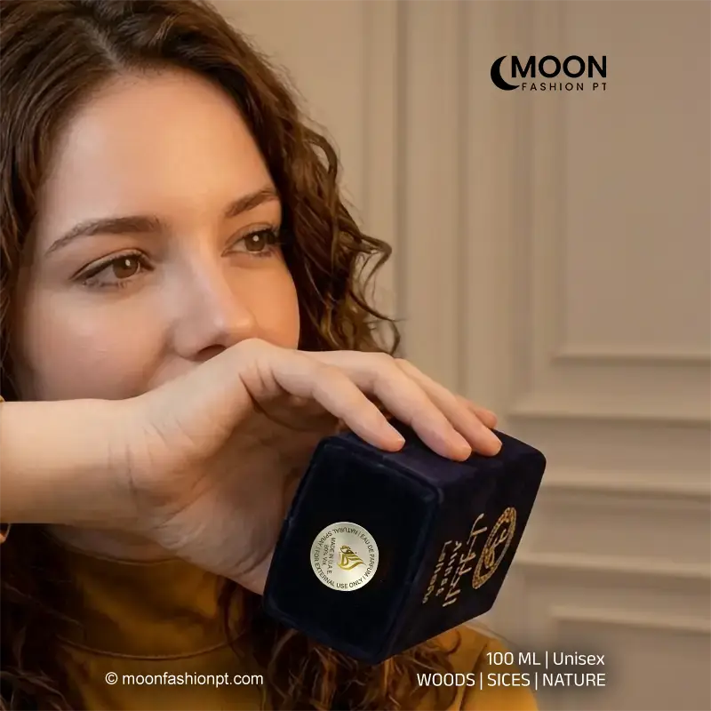 Close-up of the original Lattafa hologram authenticity seal on the bottom of the Al Noble Ameer bottle.