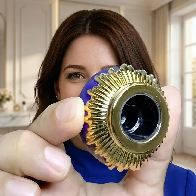 Close-up of the ornate gold cap and base of Lattafa Emaan women's EDP, perfect for luxury fragrance collectors.